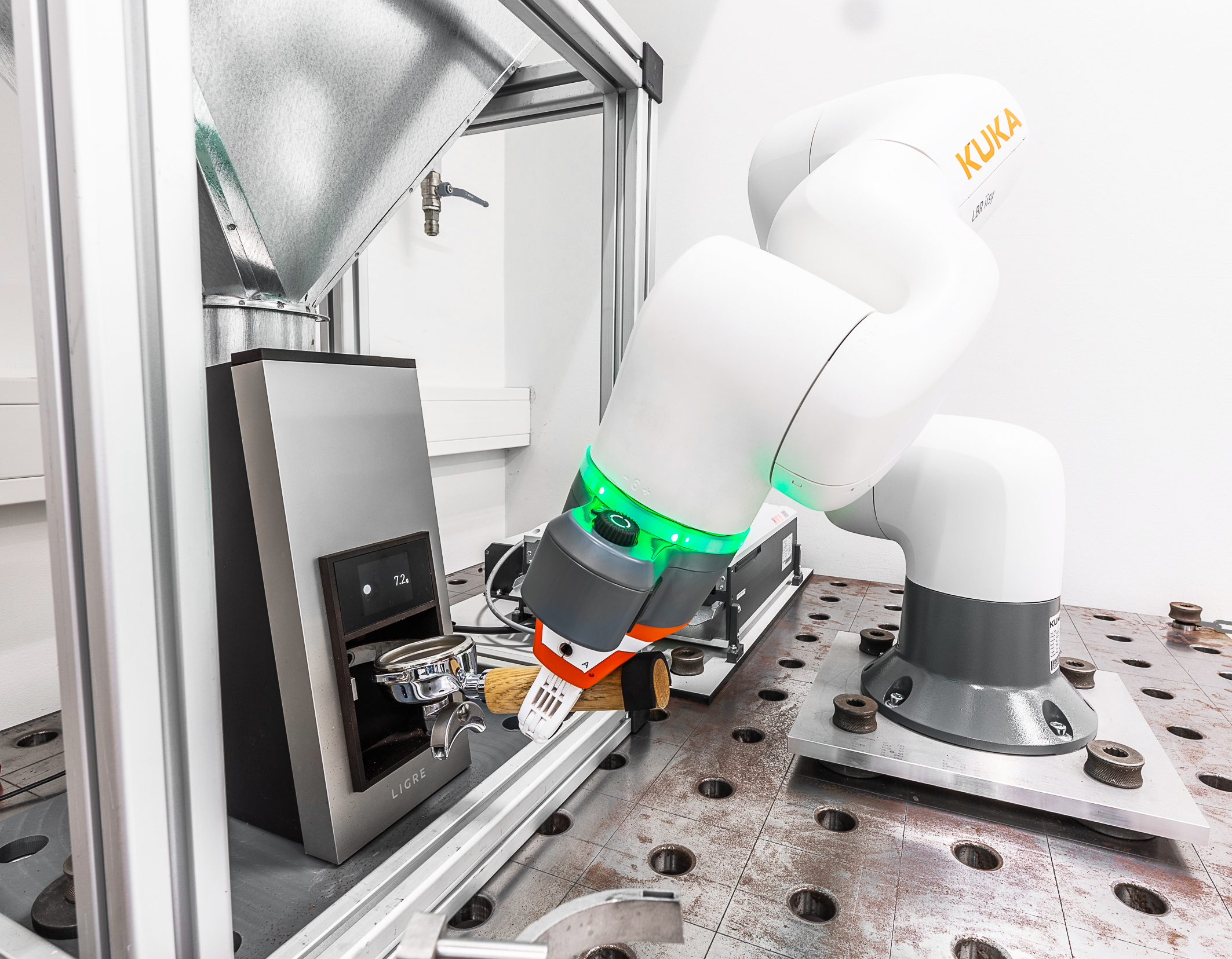 
        Robot checks coffee grinder: KUKA LBR iisy cobot in quality assurance
    